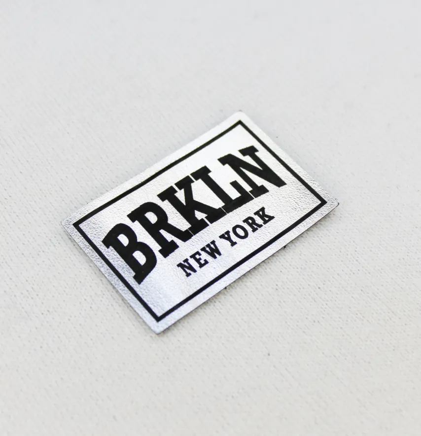 Нашивка "BRKLN" 60*40 мм срібного кольору-0