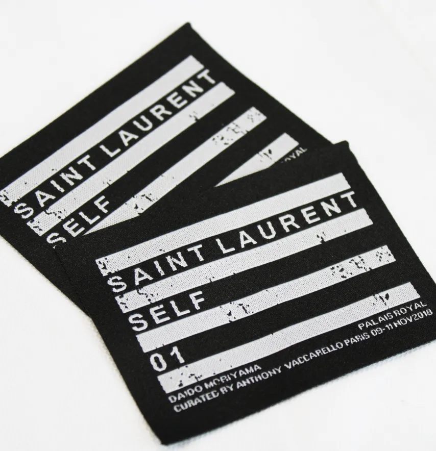 Нашивка жаккардовая "Saint Laurent" 80*60 мм черного цвета на флизелиновой основе-1