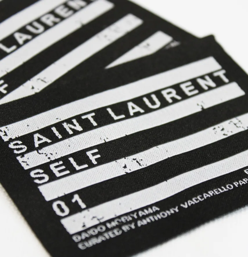 Нашивка жаккардовая "Saint Laurent" 80*60 мм черного цвета на флизелиновой основе-2