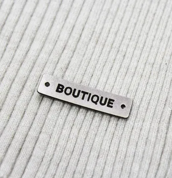 Нашивка "Boutique" 40*10 мм серебряного цвета