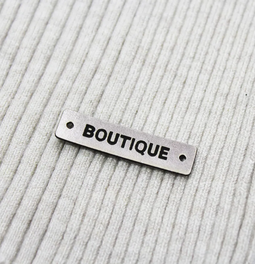 Нашивка "Boutique" 40*10 мм срібного кольору-0