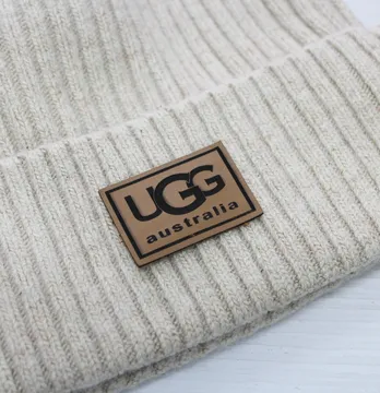 Нашивка "UGG" 45*30 мм світло коричневого кольору