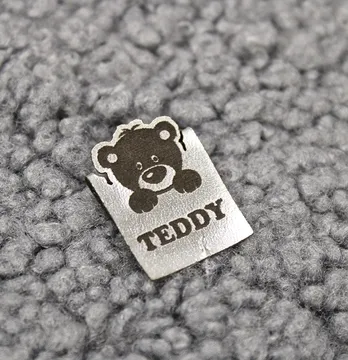 Нашивка "Teddy" 20*35 мм срібного кольору