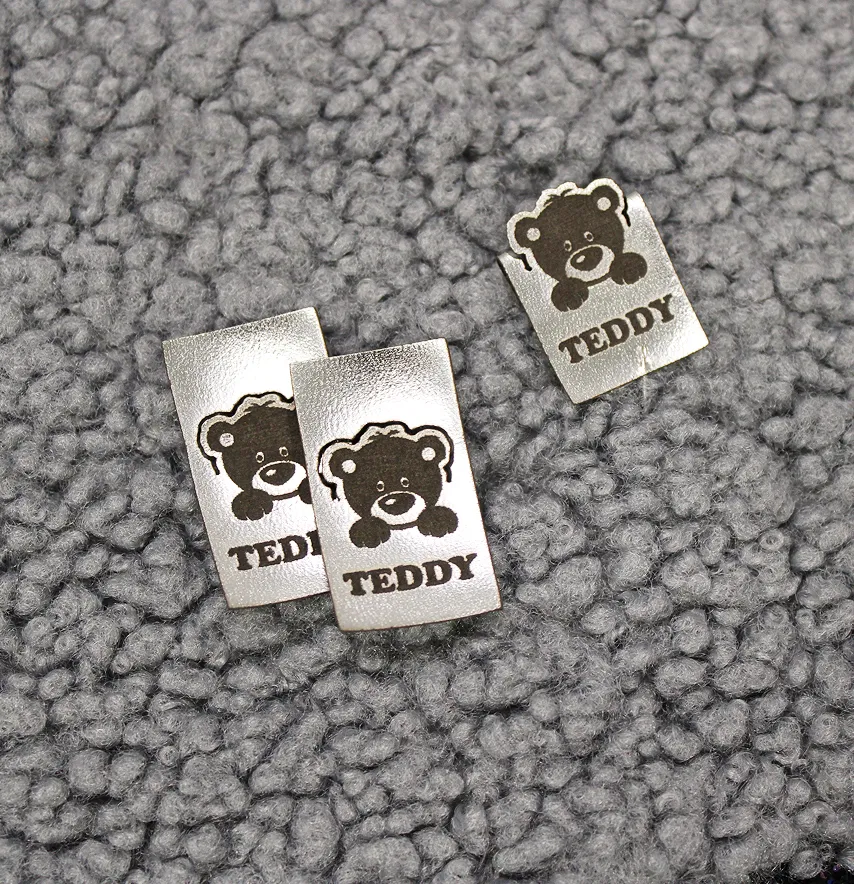 Нашивка "Teddy" 20*35 мм срібного кольору-1