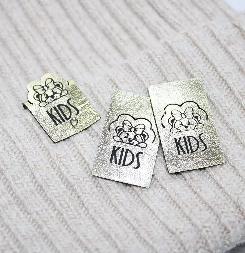Нашивка "Kids" 20*35 мм золотого кольору-1