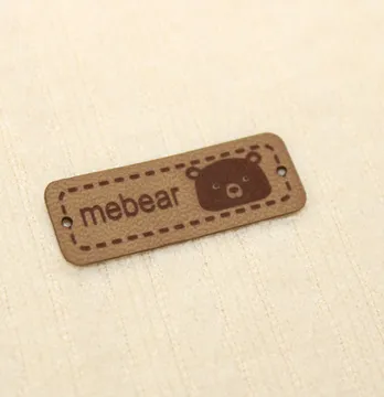 Нашивка "Mebear" 40*15 мм песочного цвета