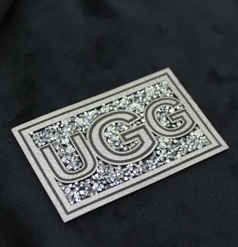 Нашивка з акриловим камінням "UGG" 80*50 мм сірого кольору зі срібним камінням