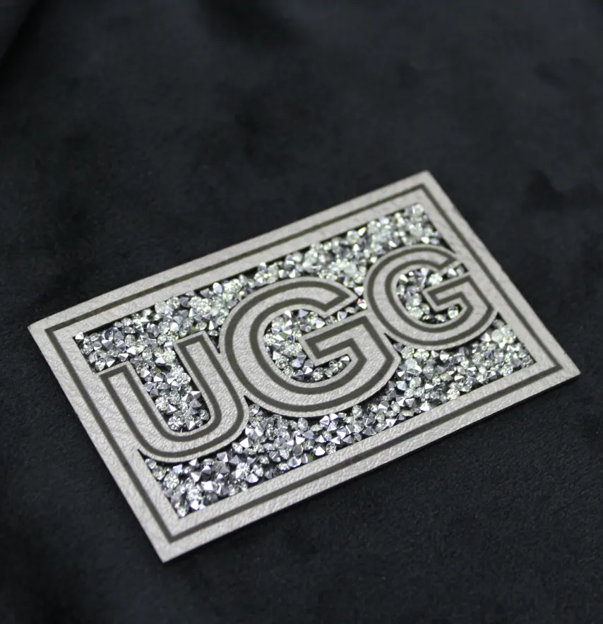 Нашивка з акриловим камінням "UGG" 80*50 мм сірого кольору зі срібним камінням-0
