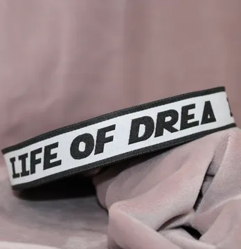 Тесьма жаккардовая "Life of drea" 20 мм белого цвета