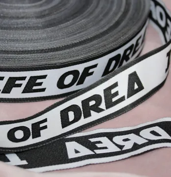 Тесьма жаккардовая "Life of drea" 30 мм белого цвета