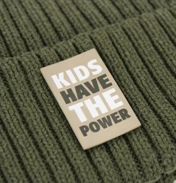 Нашивка "Kids have the power" 25*40 мм бежевого кольору