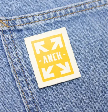 Нашивка "ANCK" 40*50мм желтого цвета