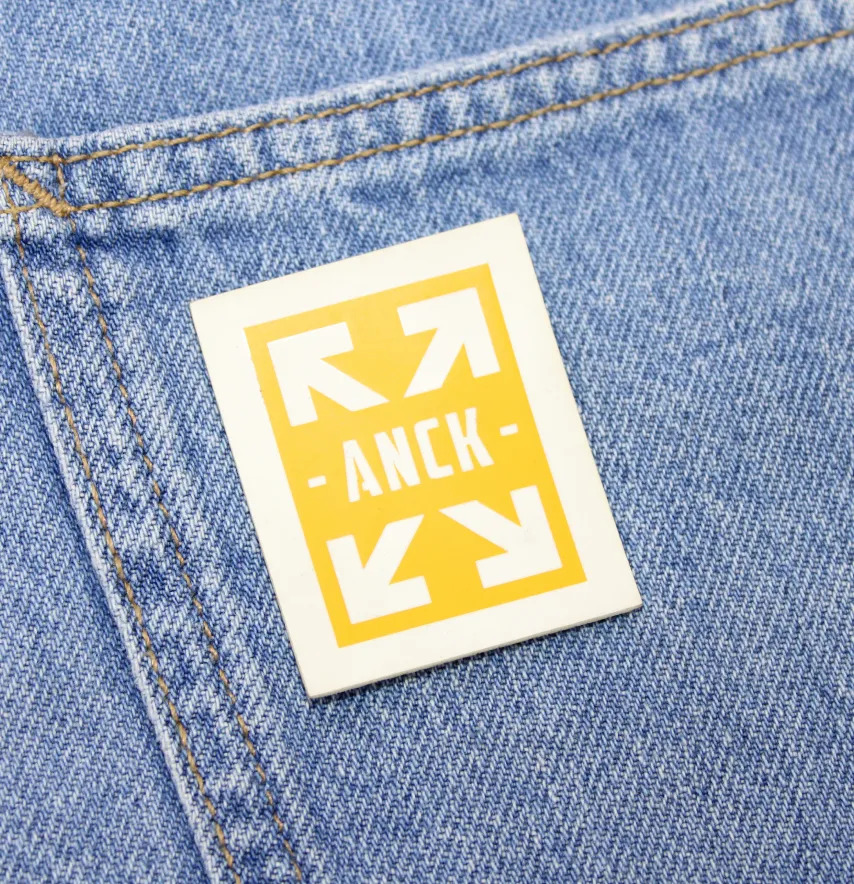 Нашивка "ANCK" 40*50мм желтого цвета