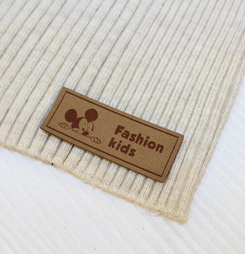 Нашивка "Fashion kids" 50*20 мм пісочного кольору-0