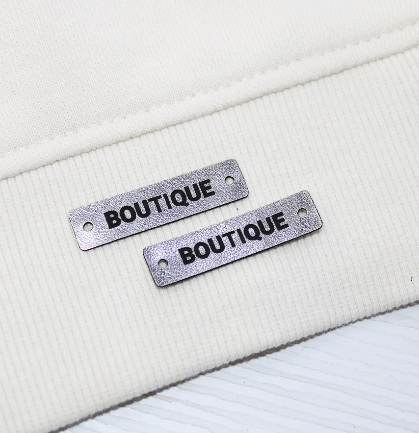 Нашивка "Boutique" 40*10 мм графітового кольору-1