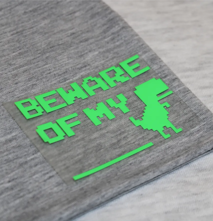Термоаплікація з плівки "Beware of my Динозавр" 7*5 см зеленого кольору-1