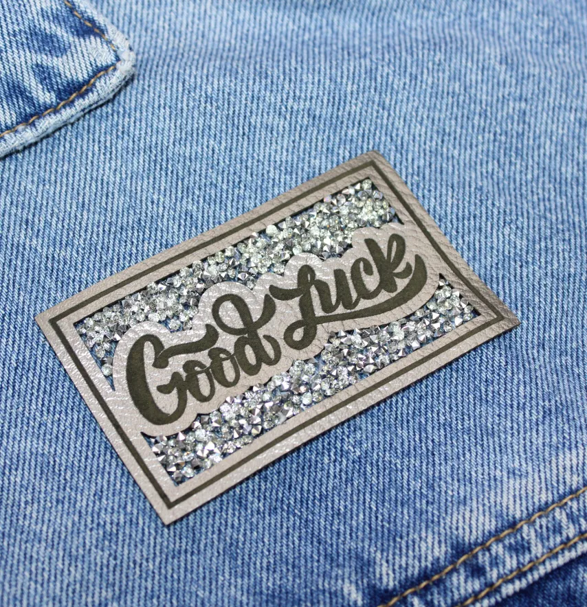 Нашивка з акриловим камінням "Good Luck" 80*50 мм сірого кольору-0