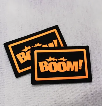 Нашивка "BOOM!" 80*50 мм чорного кольору з помаранчовим написом