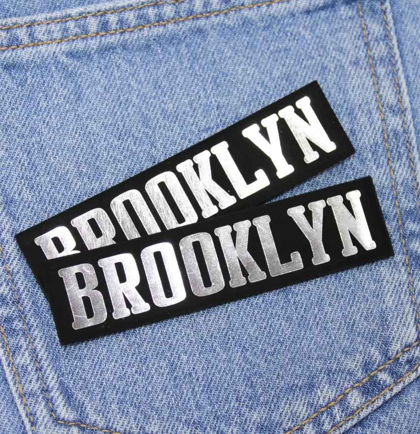 Нашивка "BROOKLYN" 100*25 мм чорного кольору з дзеркальним написом-0