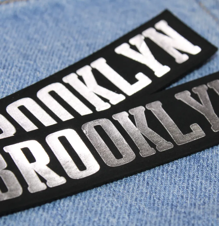 Нашивка "BROOKLYN" 100*25 мм чорного кольору з дзеркальним написом-1