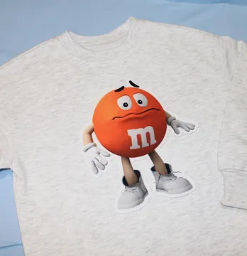Нашивка тканева фігурна "M&Ms" 19,5*21см помаранчевий