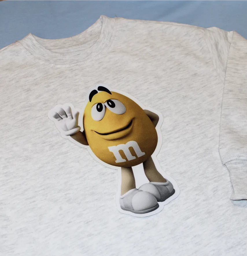 Нашивка тканева фігурна "M&Ms" 19,5*21см жовтий-1