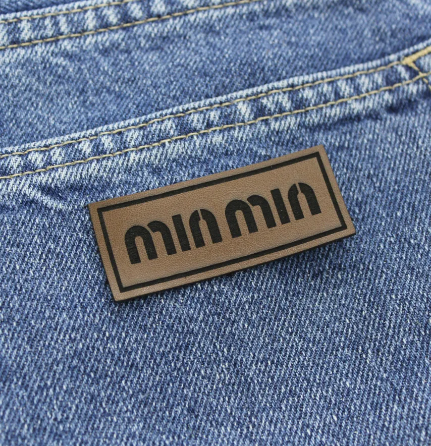 Нашивка "MinMin" 60*25 мм темно-коричневого кольору-1
