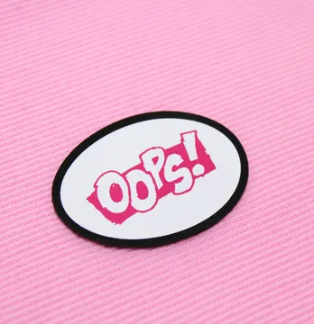 Нашивка "Oops" 60*45мм розового цвета