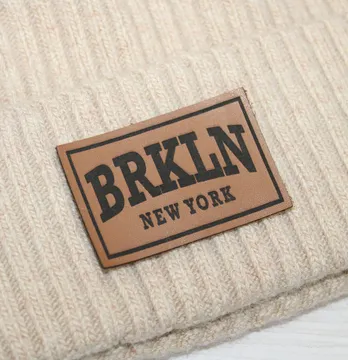 Нашивка "BRKLN" 60*40 мм світло-коричневого кольору