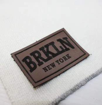 Нашивка "BRKLN" 60*40 мм темно коричневого кольору