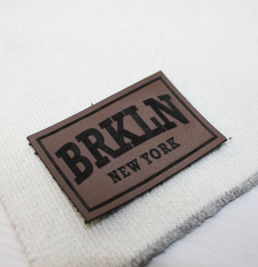 Нашивка "BRKLN" 60*40 мм темно коричневого кольору-0