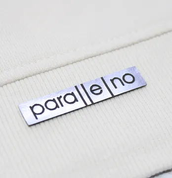 Нашивка "Parallelno" 50*10 мм срібного кольору