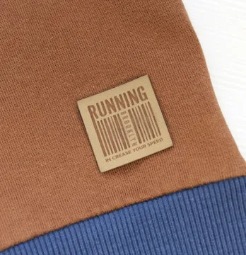 Нашивка "Running" 35*35 мм пісочного кольору