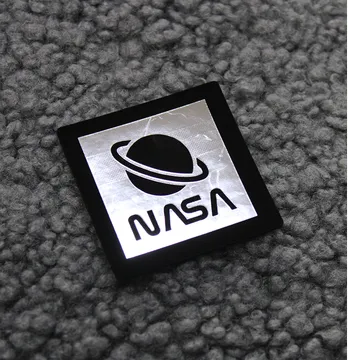 Нашивка "NASA" 45*45 мм чорного кольору зі сріблом