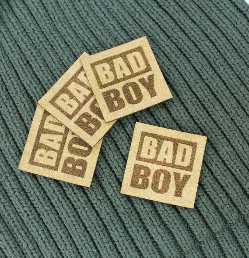 Нашивка "Bad boy" 35*35 мм бежевого кольору структурна-1