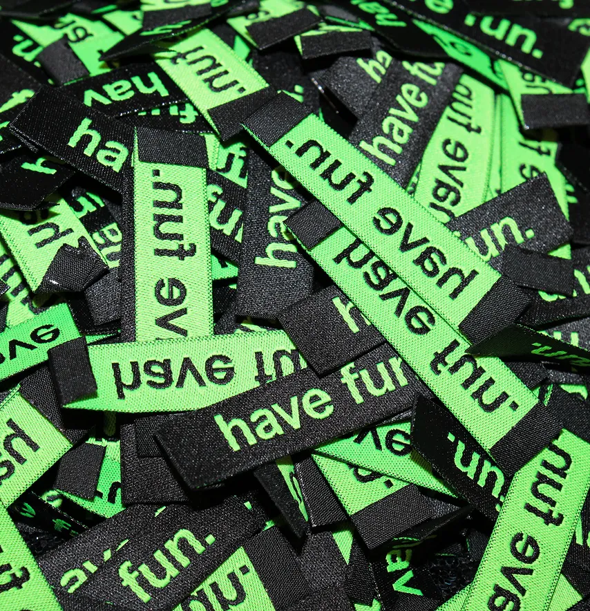 Бирка жакардова "Have fun" 50*12 мм чорного кольору з зеленим лого-3