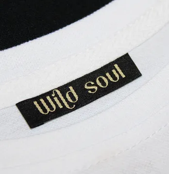 Бирка жаккардовая "Wild soul" 50*12 мм черного цвета с золотым лого