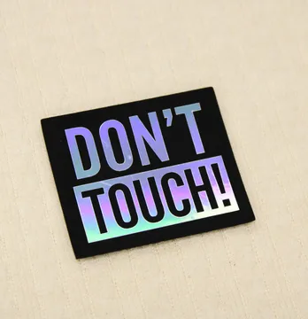 Нашивка "Dont touch" 60*50мм черного цвета с голограммой