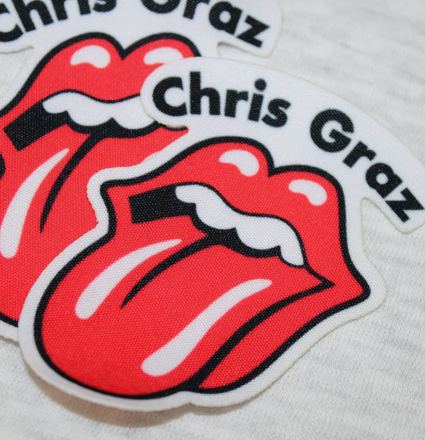 Нашивка тканева фігурна "Chris Graz" язик 6*8 см-1