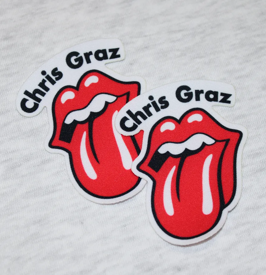 Нашивка тканева фігурна "Chris Graz" язик 6*8 см-2