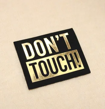 Нашивка "Dont touch" 60*50мм черного цвета с золотой надписью