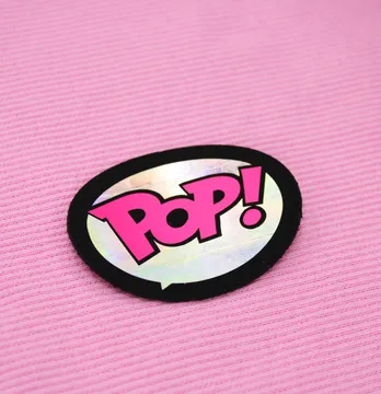Нашивка "Pop it" 60*45мм черного цвета с розовой надписью