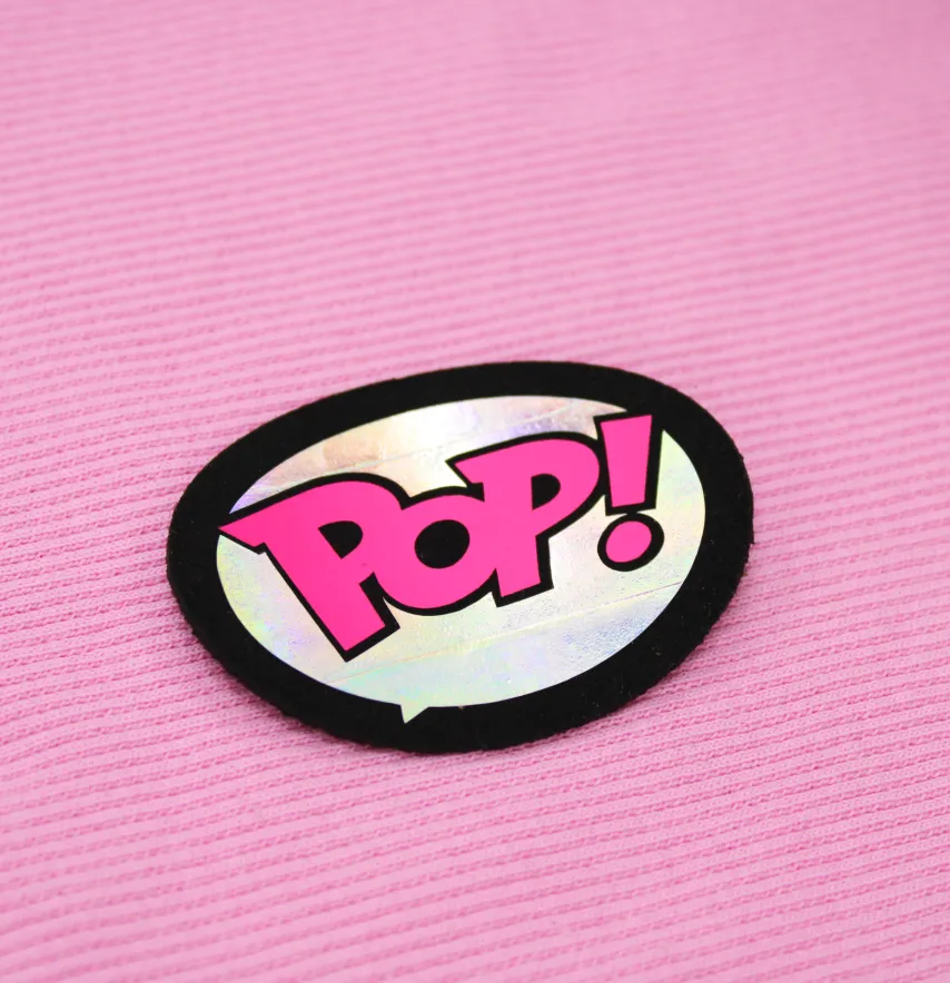Нашивка "Pop it" 60*45 мм чорного кольору з рожевим написом-0