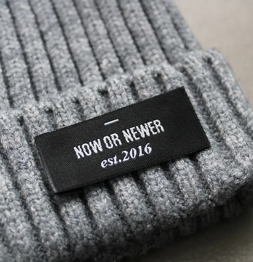 Бирка жакардова "Now or never" 45*20 мм чорного кольору -1
