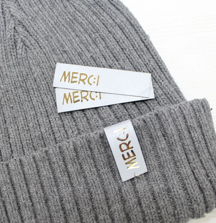 Нашивка светоотражающая "Merci" 16*60 мм-1