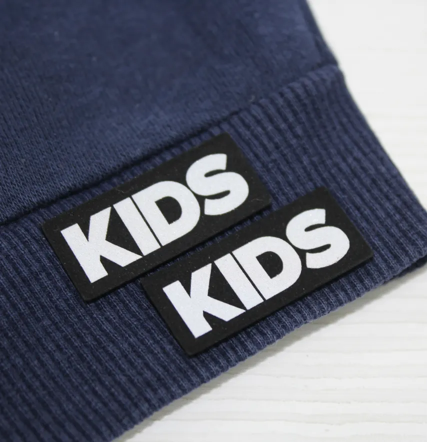 Нашивка світловідбивна "Kids" 35*15 мм чорного кольору-1