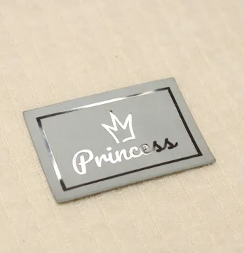 Нашивка "Princess" 60*40мм серого цвета