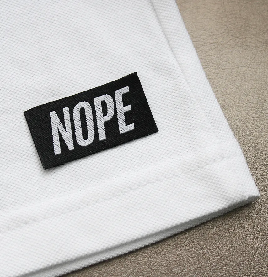 Бирка жакардовая "Nope" черного цвета 45*25 мм-2