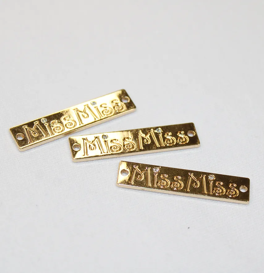 Лейба металлическая "Missmiss" длина 35*8 мм золото со стразами.-3