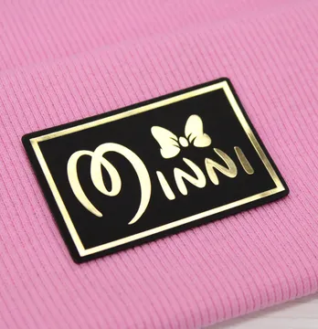 Нашивка "Minni" 60*40мм черного цвета с золотом